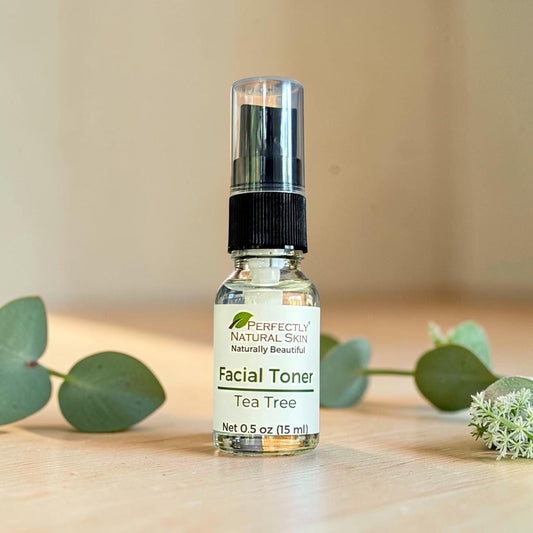 Glow Natural Tea Tree Toner 2 oz bottle, lifestyle product photo for clarifying toner with tea tree