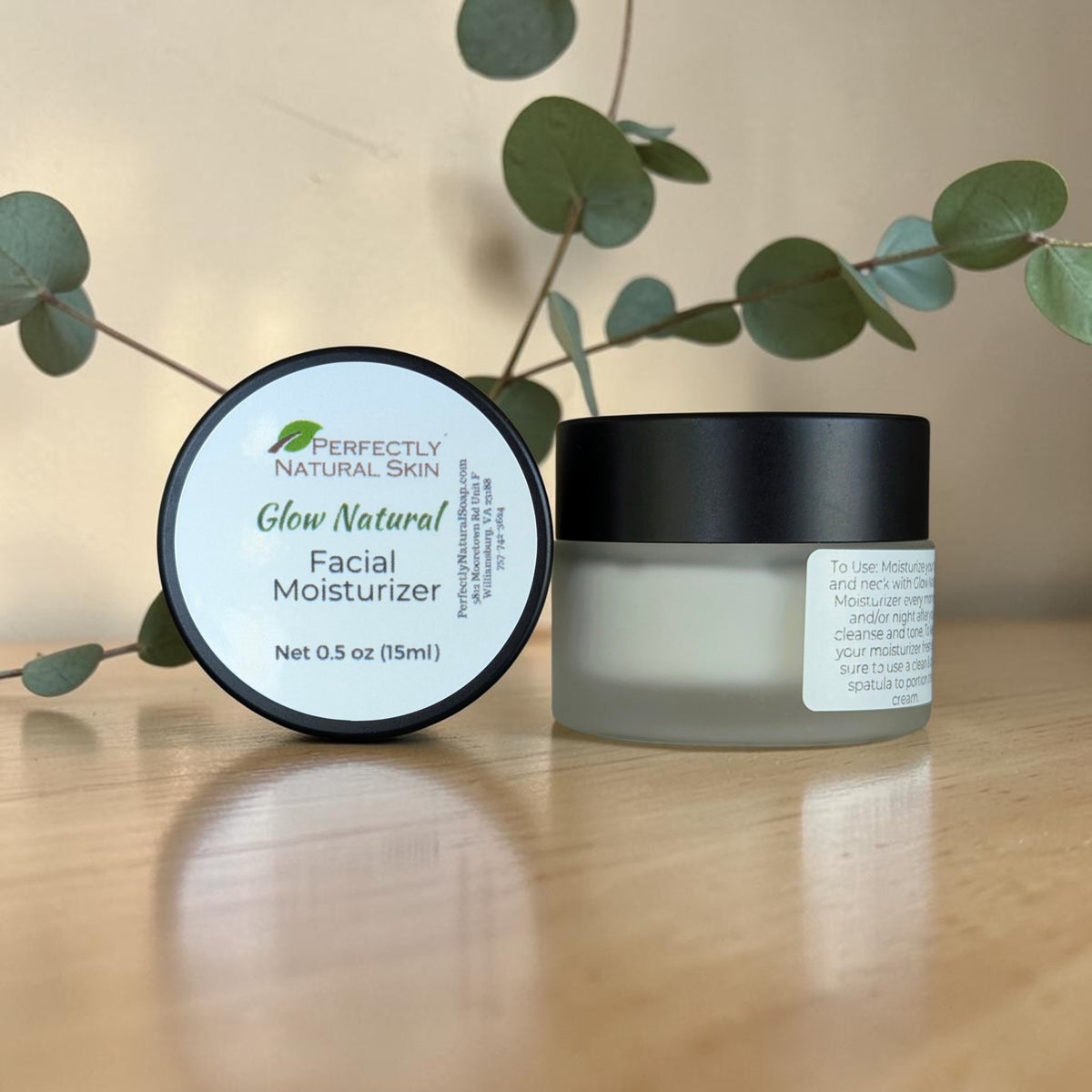 Glow Natural Facial Moisturizer with rosehip and vitamin complex, lifestyle product photo showing hydrating face cream jar