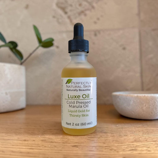 Luxe Oil cold pressed marula oil in a 2 oz glass dropper bottle, pure single-ingredient facial oil