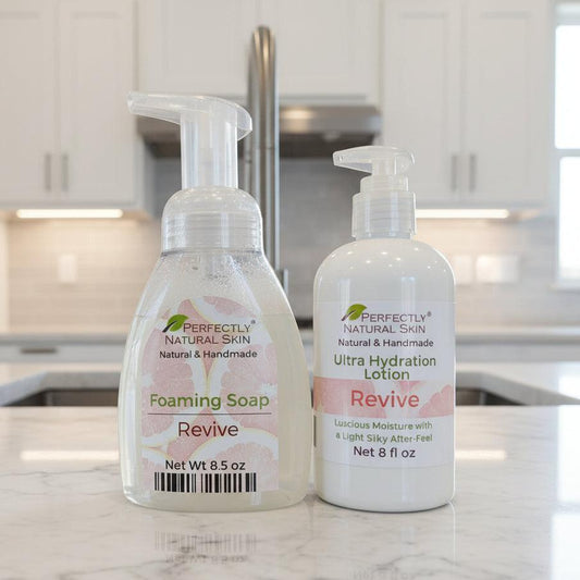 Two bottles of 'Perfectly Natural Skin' products on a kitchen counter.
