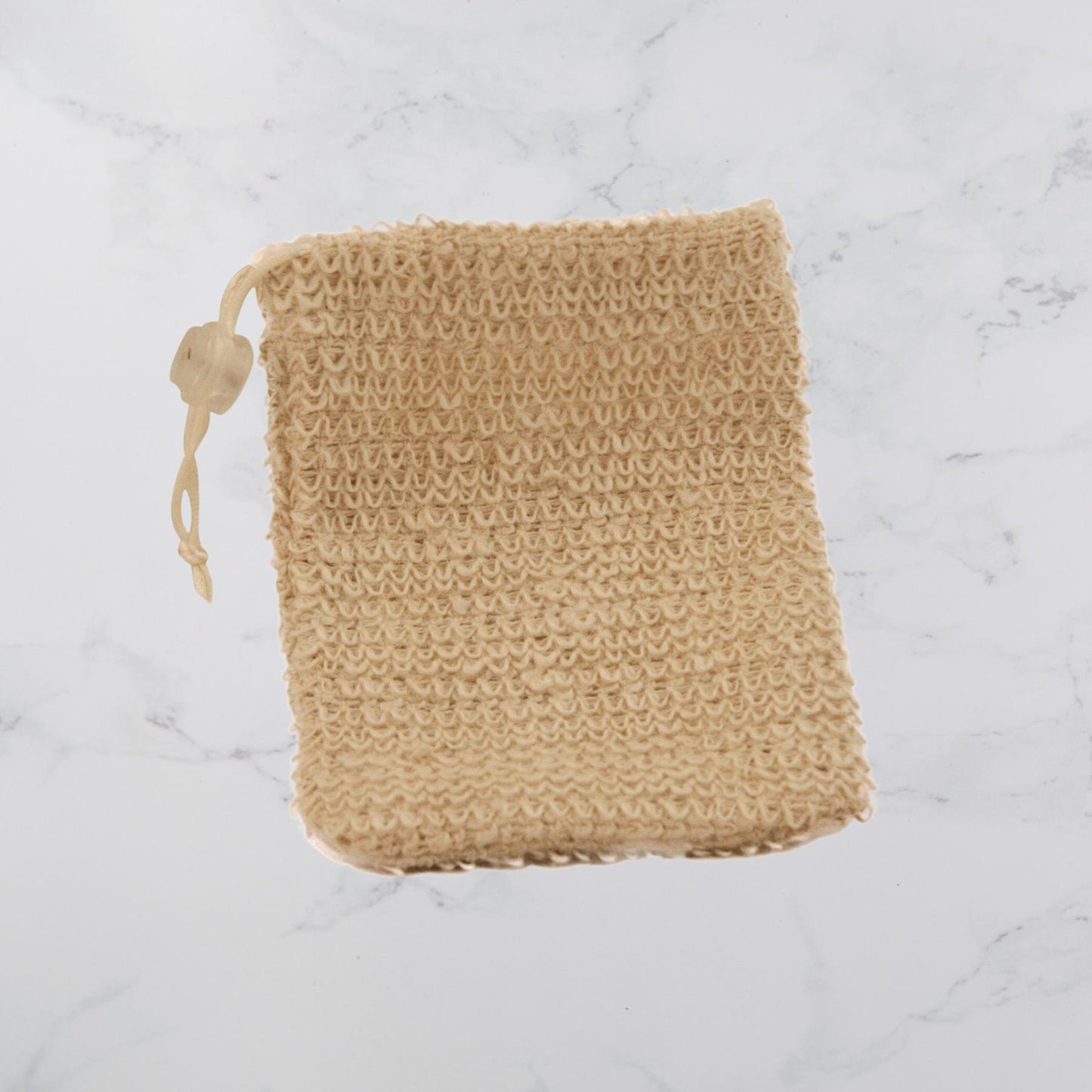 https://www.perfectlynaturalsoap.com/cdn/shop/files/Sisal-Soap-Saver-Pouch-Bath-Accessories.jpg?v=1684930856&width=1445